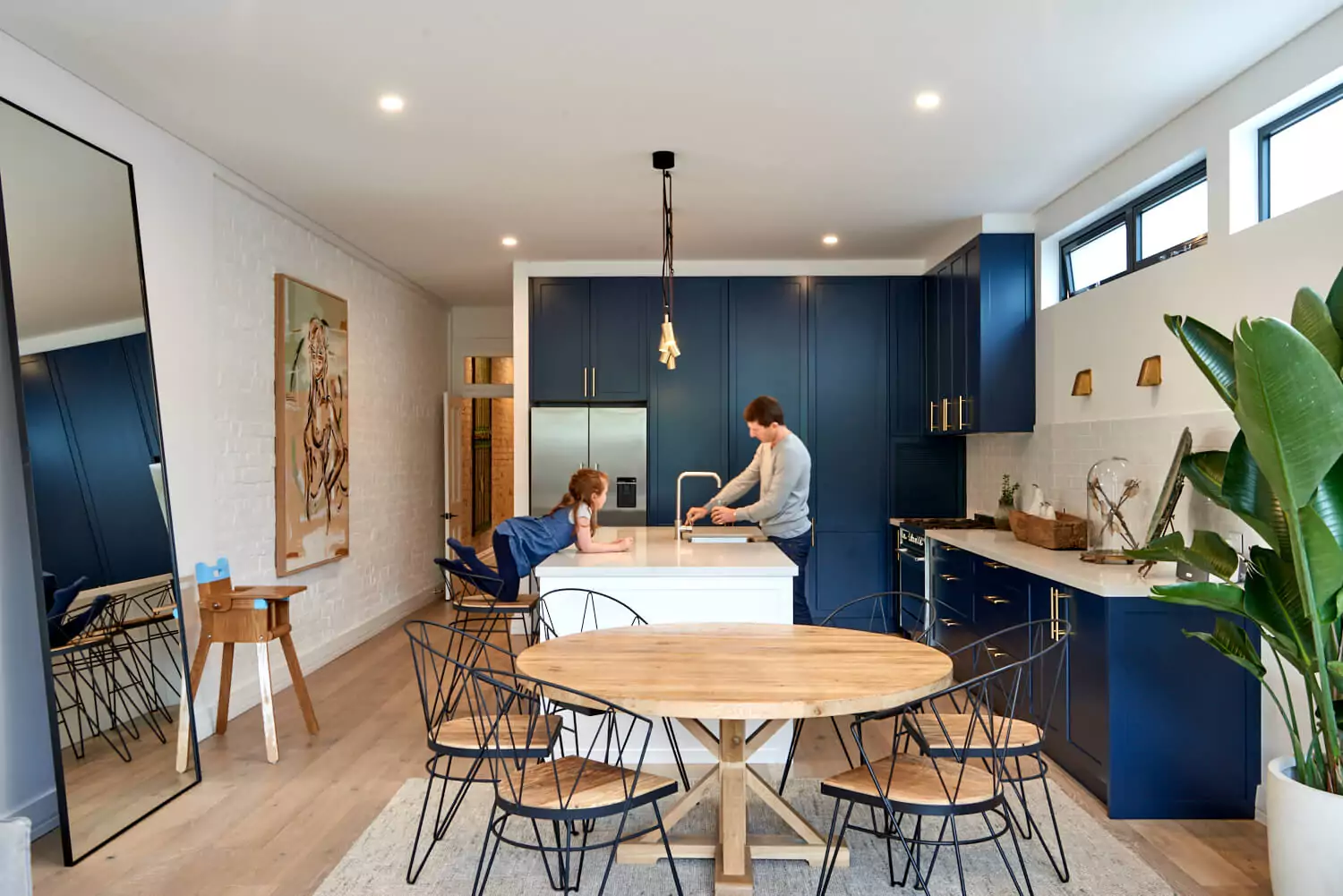 Hamptons navy Shaker cabinetry and contrasting white marble island | Custom joinery by Improva, Manly