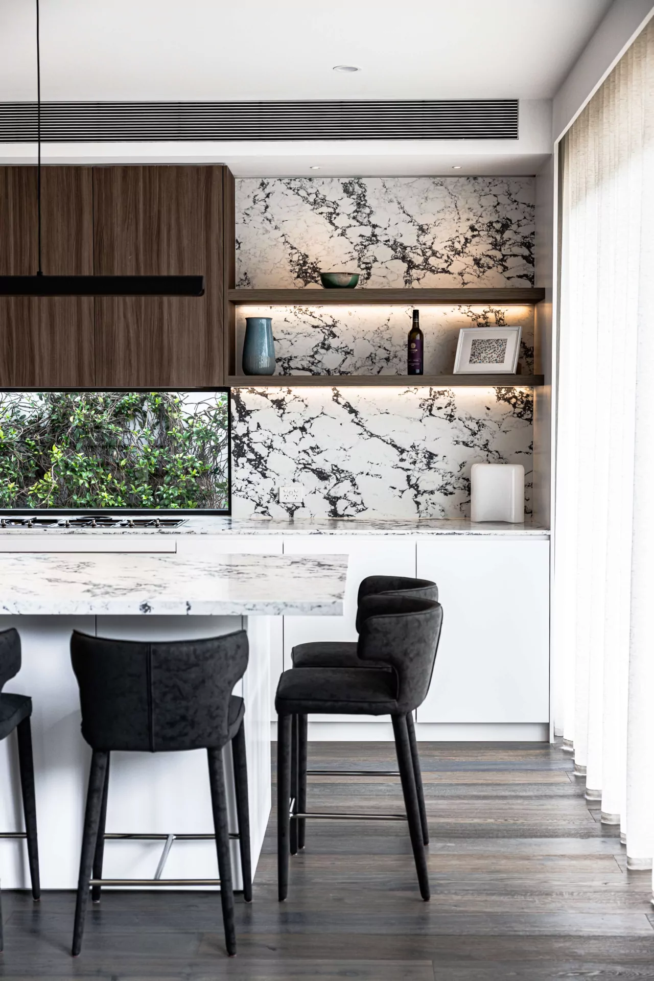 Luxury marble kitchen island with upholstered seating | Custom joinery by Improva, Dover Heights