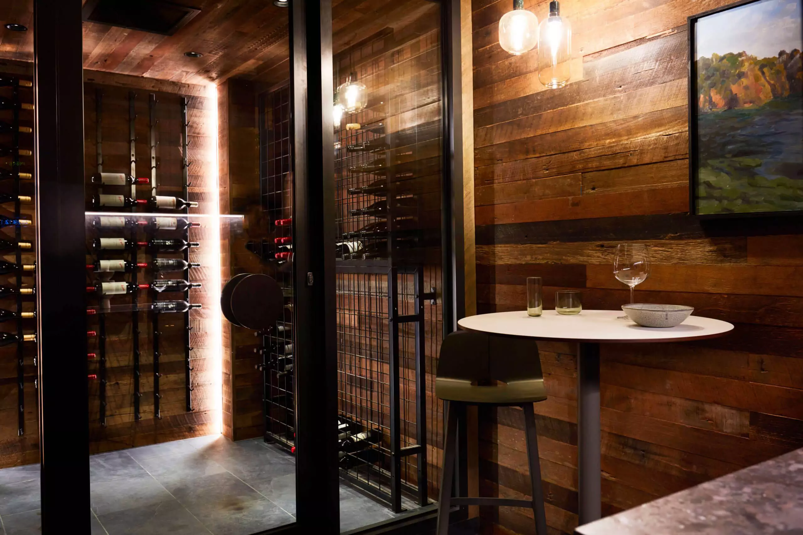 Wine cellar bar with climate-controlled storage and tasting area | Quaterdeck, Sugarloaf Bay, Sydney. Photo by Prue Ruscoe
