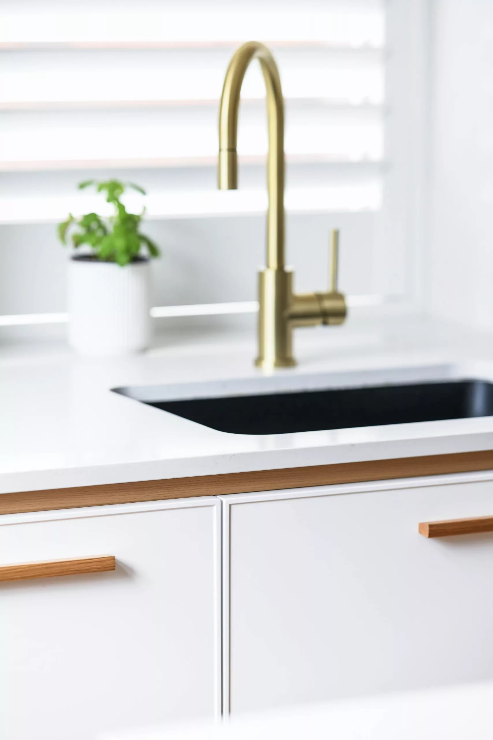 White Shaker cabinetry with brass tapware detail | Custom joinery by Improva, Coogee