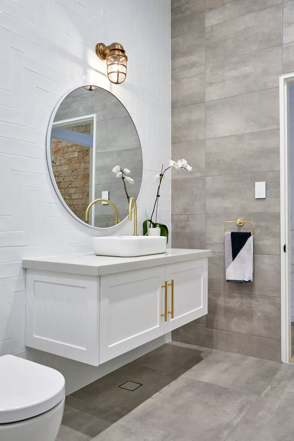 White floating Shaker vanity with brass hardware | Custom joinery by Improva, Manly